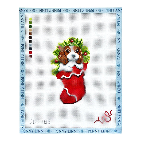 Cavalier Puppy in a Stocking